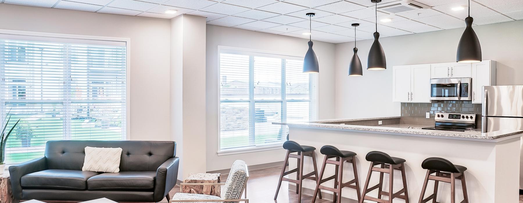 a kitchen and living room