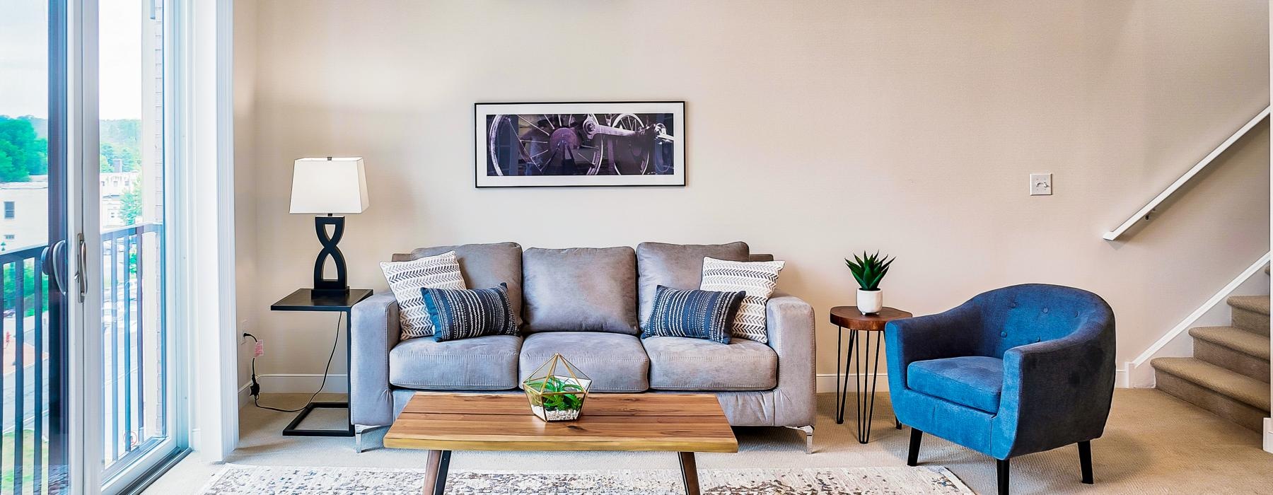 a living room with a couch and a coffee table