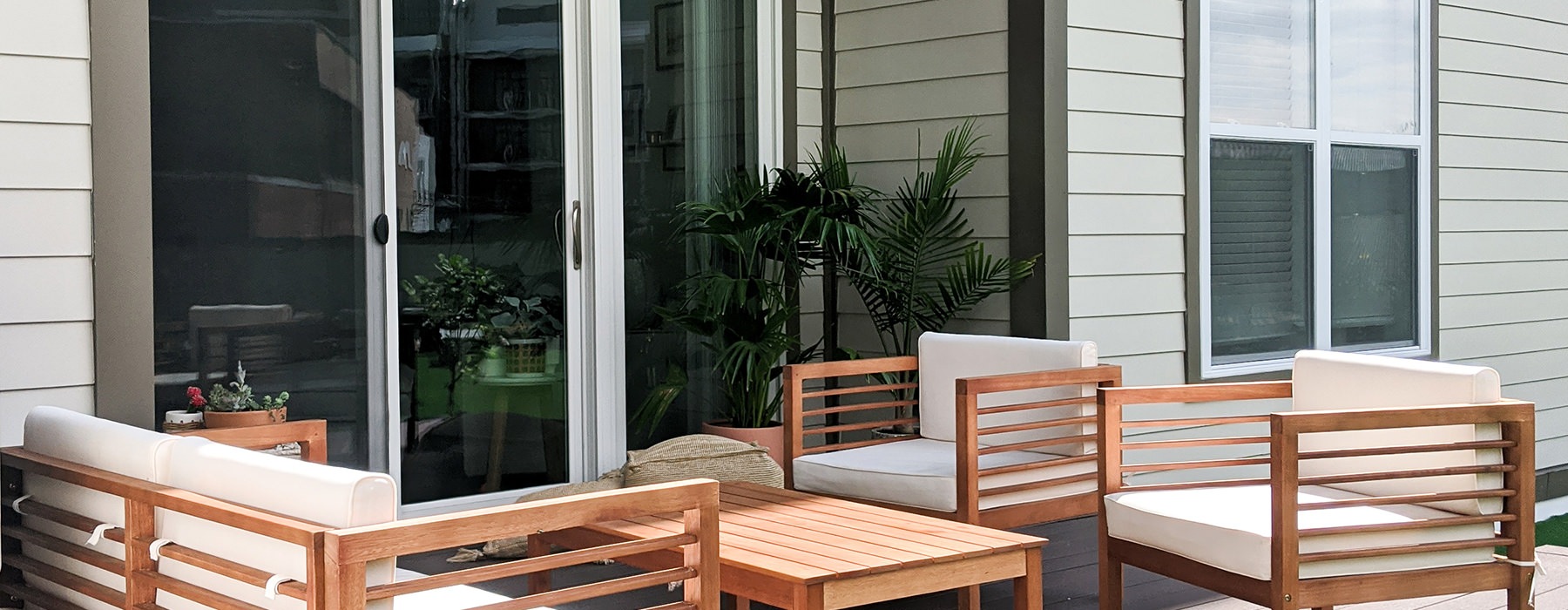 patio with seating and sliding glass doors